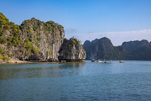  Karst islands and fishing boats, Lan Ha Bay, Haiphong, Vietnam, Asia 