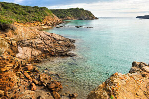 rocky inlet in front of the village of Es Grau, s'Albufera des Grau Natural Park, Menorca, Balearic Islands, Spain, Europe