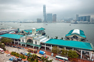 Elevated view of the Central Pier building and Victoria Harbour. Hong Kong, China.