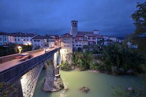  View at the Ponte Diavolo, Cividale del Friuli with tower of the Duomo on the river Natisone, Friuli, Northern Italy 