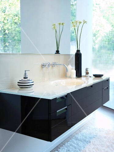 Bathroom With White Washbasin In Black Cabinet Buy Images