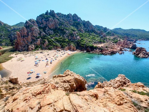 People at Li Cossi beach, Costa Paradiso, Sardinia, Italy – buy images ...