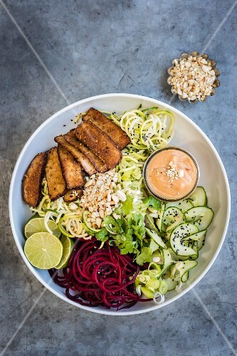 Spiralised vegetables with tofu and spicy peanut sauce