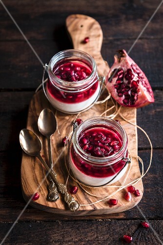 Served sweet panna cotta on wooden background