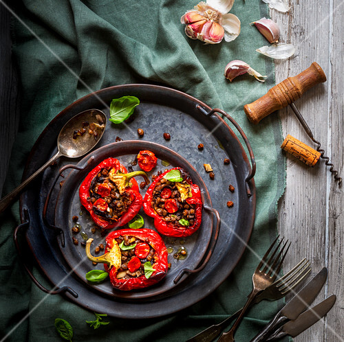 Roasted red peppers stuffed with lentils, tomatoes and garlic
